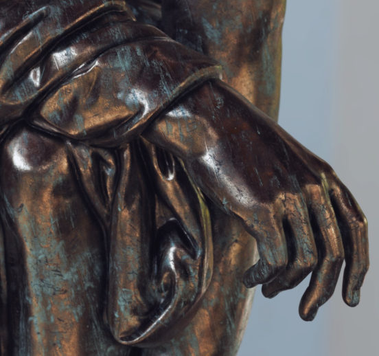 Hand of a bronze statue